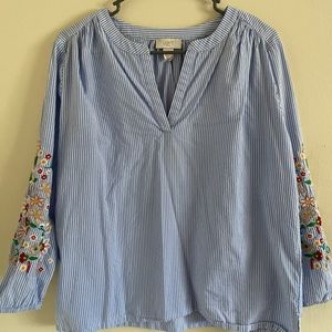 Beautiful blouse with embroidery on sleeve
